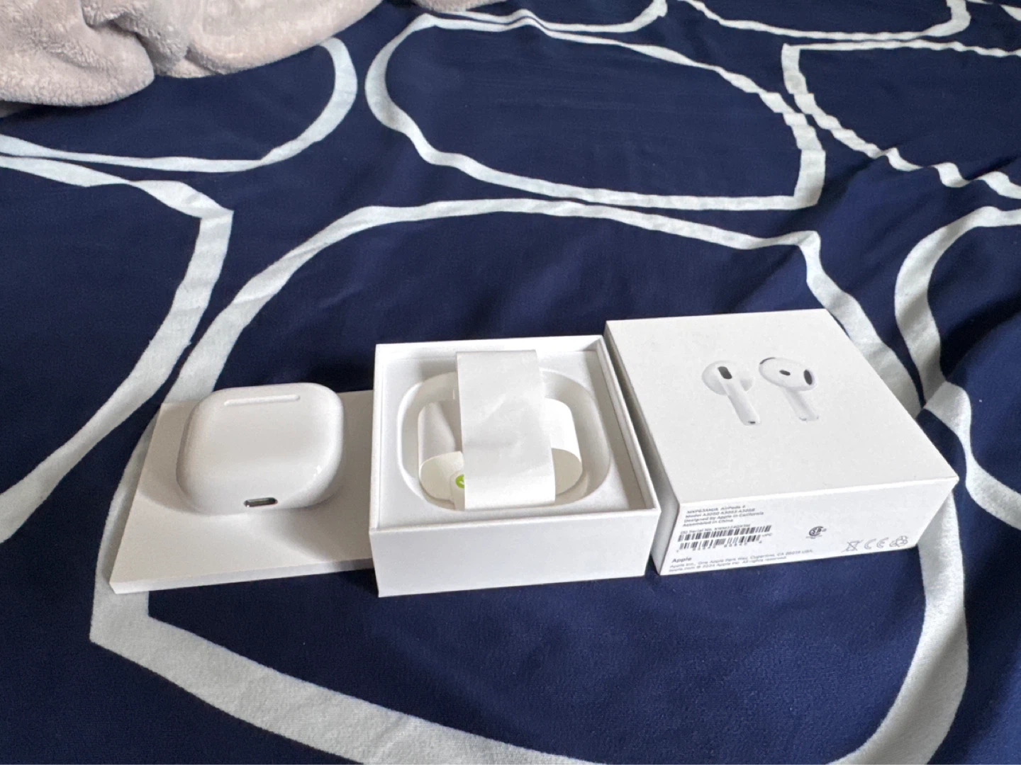 Apple AirPods (4th Generation) with Charging Case