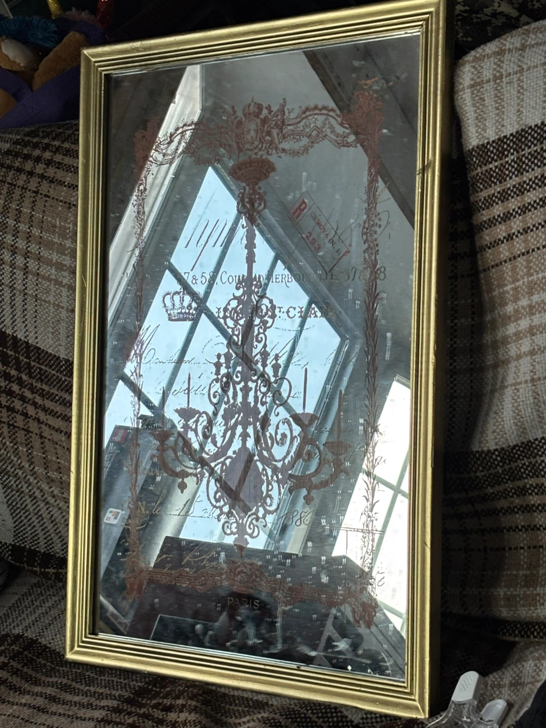 Decorative Mirror with Chandelier and Script Design