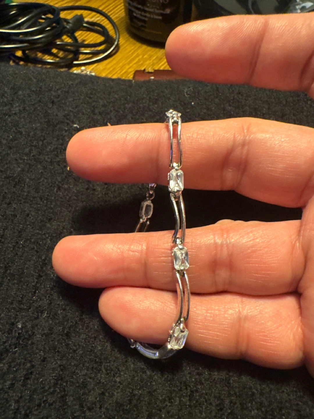 Silver-tone bracelet with clear rectangular stones