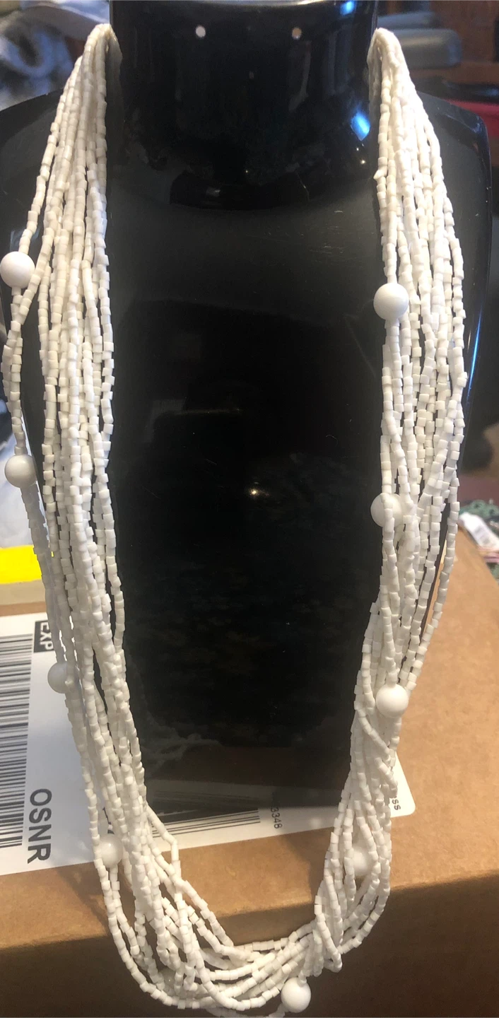 Multi-strand white beaded necklace