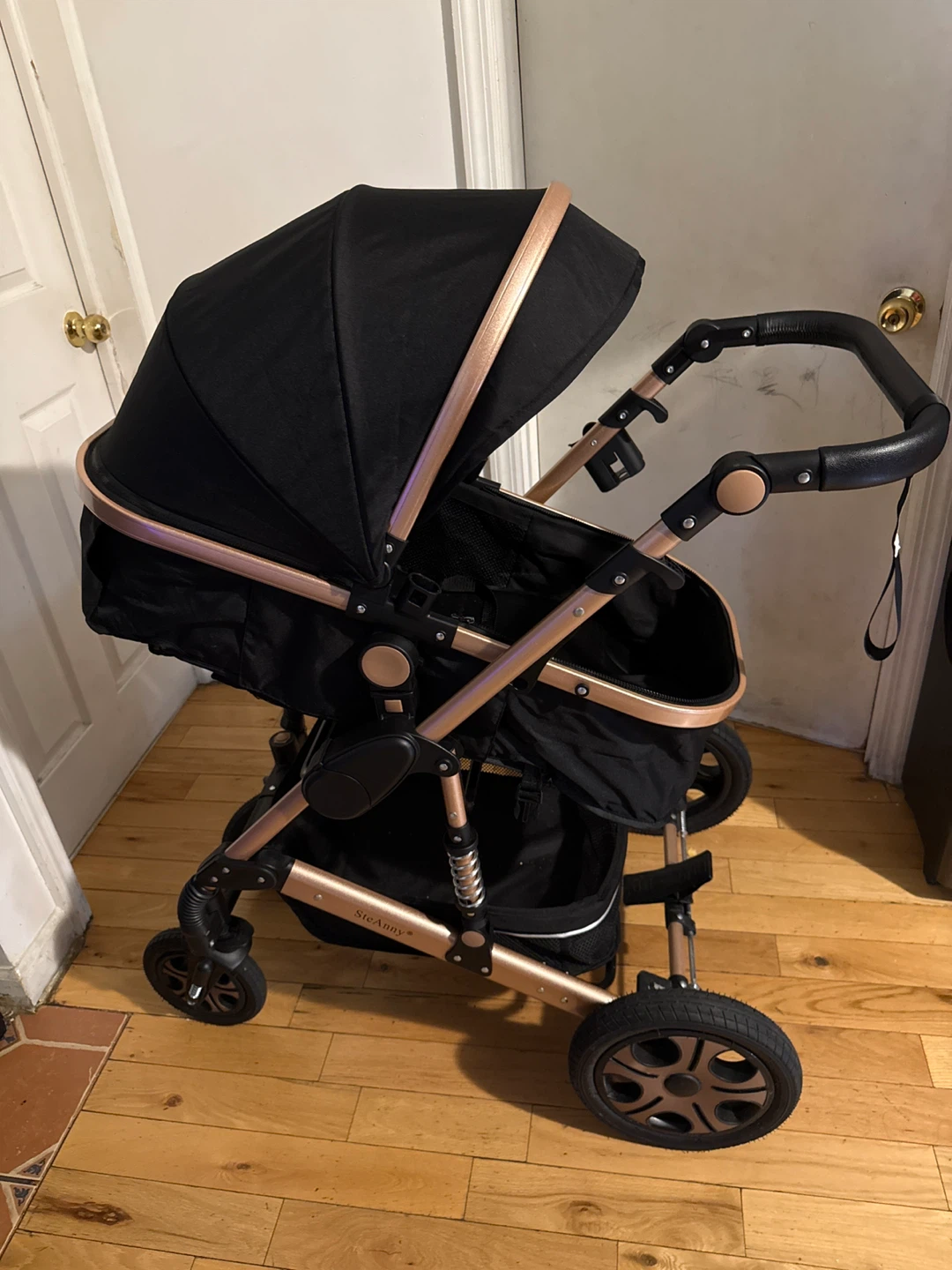 Black Stroller with Rose Gold Accents