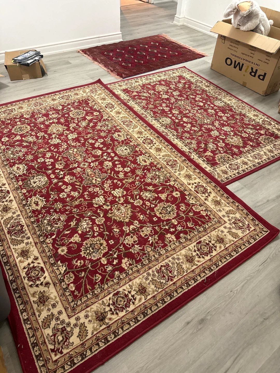 Primo International PAUL W55640 Red and Cream Area Rug