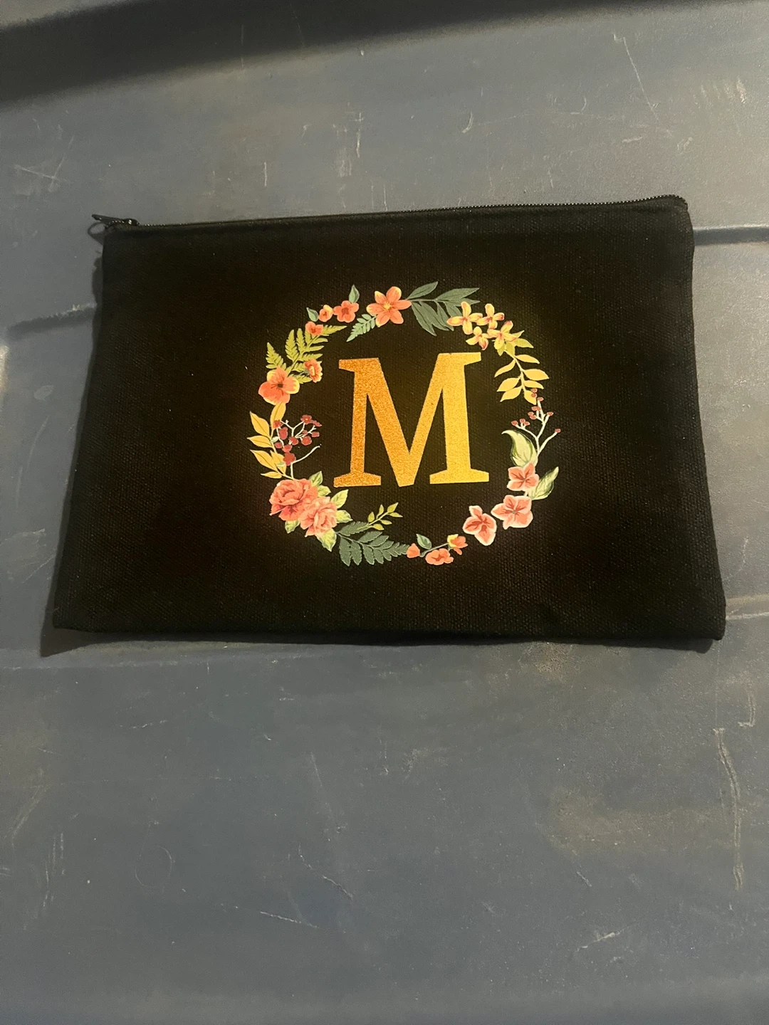 Black Pouch with Floral 'M' Design