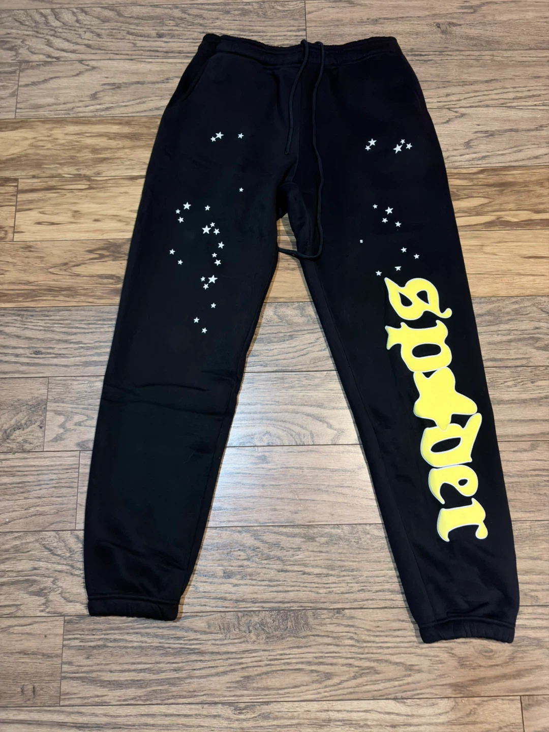 Spider Black Sweatpants with Yellow Logo and Stars