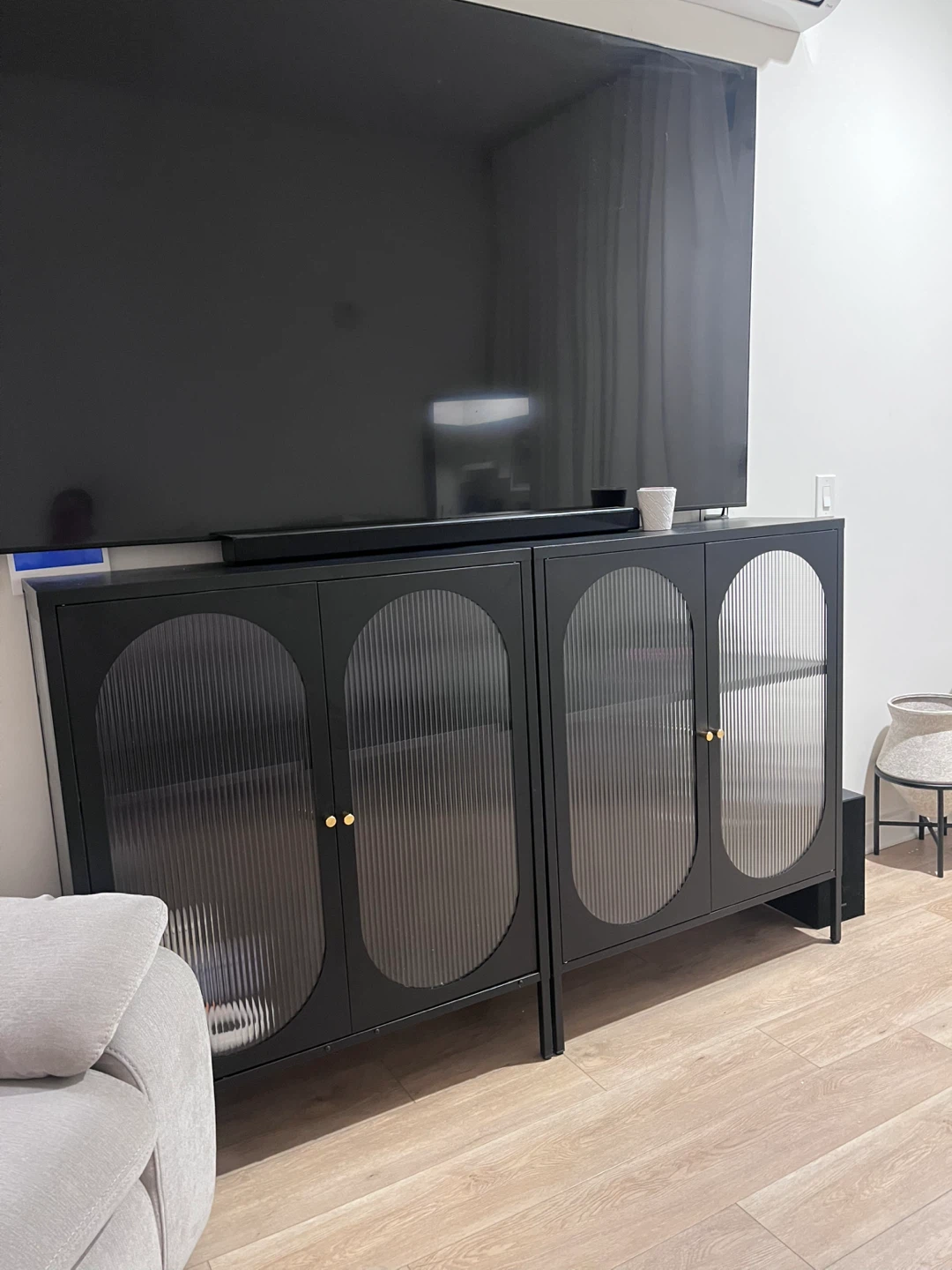 Black Storage Cabinet with Fluted Glass Doors