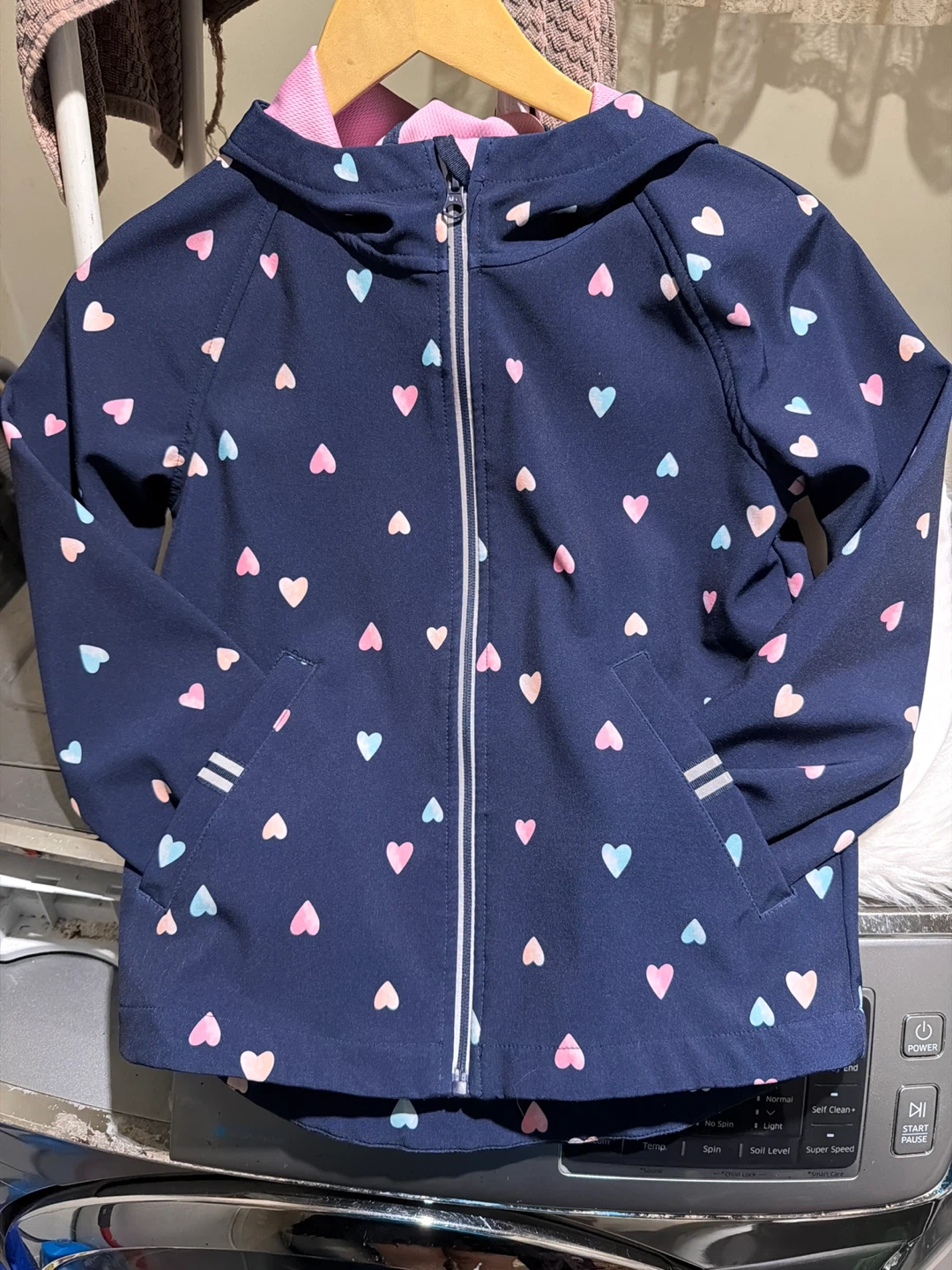 Navy blue jacket with pink hearts, size M/M (7-8)