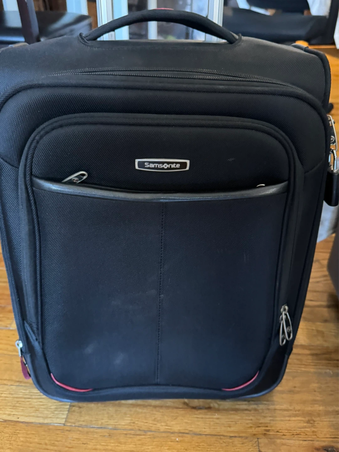 Samsonite Black Rolling Carry on suitcase