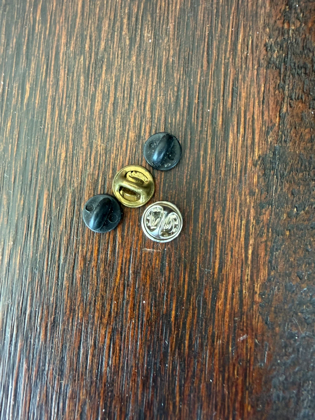 Free pin backs