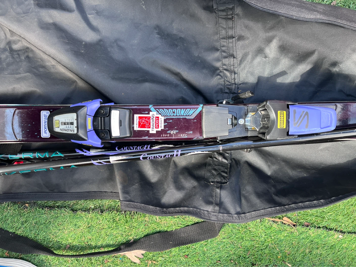 Salomon Skis with Bindings and Poles in Bag