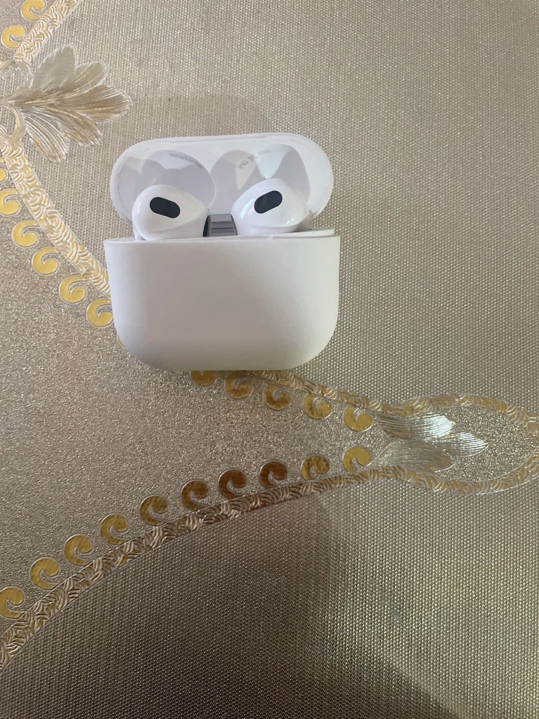 Apple AirPods Pro (3rd Generation) with white cover