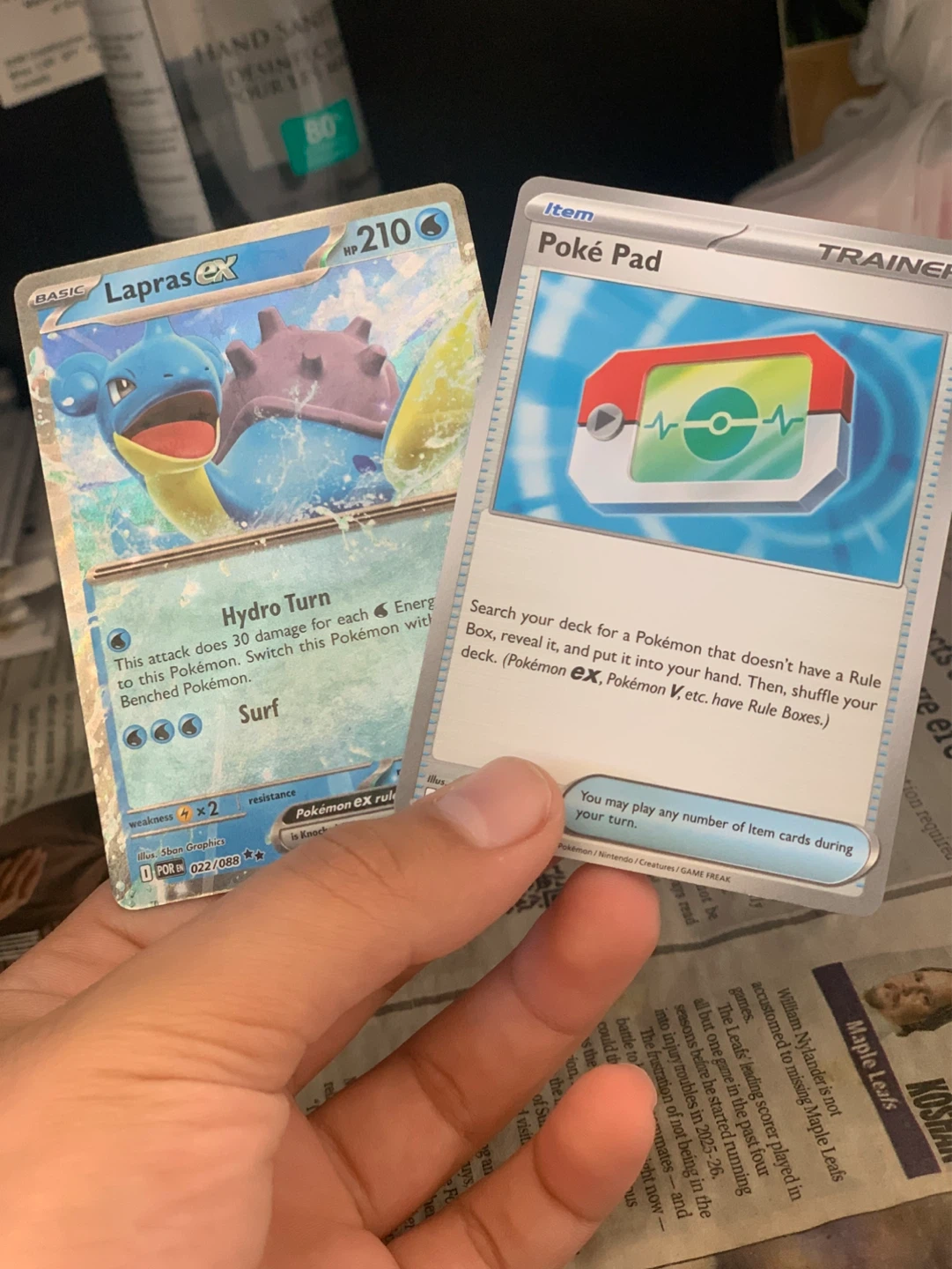 Pokémon TCG Lapras ex and Poké Pad cards
