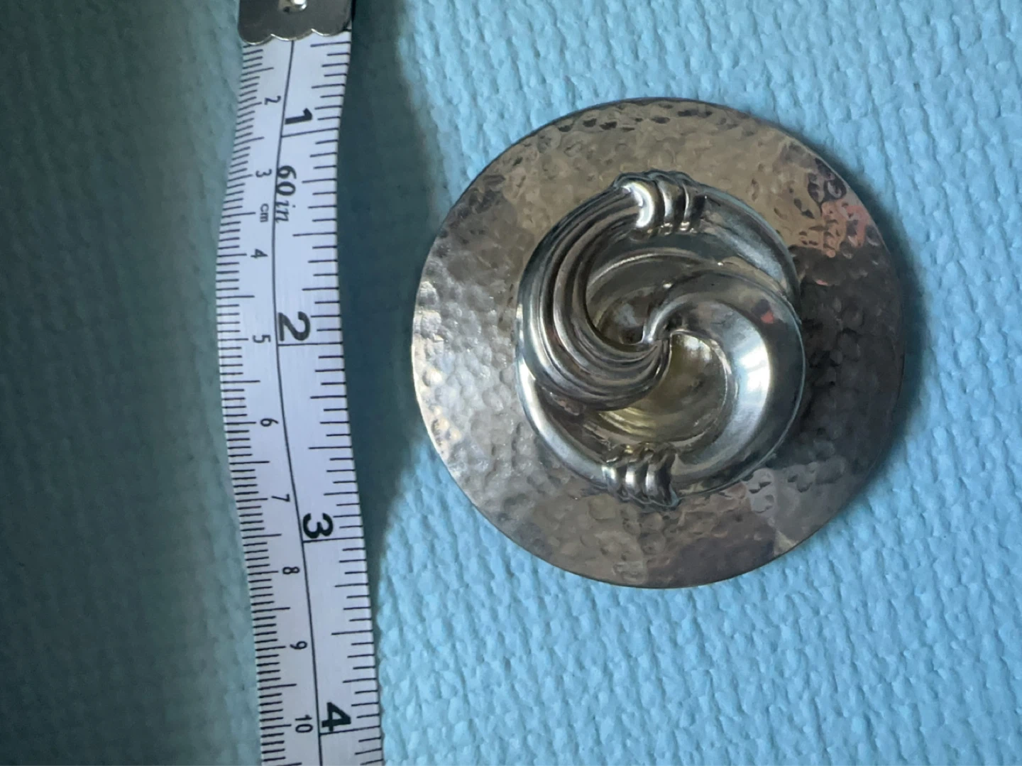 Hammered Silver Tone Round Brooch with Swirl Design
