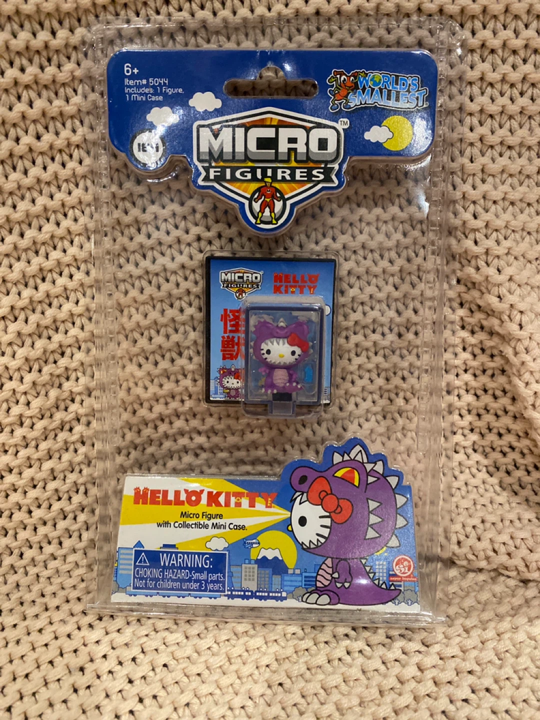 World's Smallest Micro Figures Hello Kitty Dinosaur