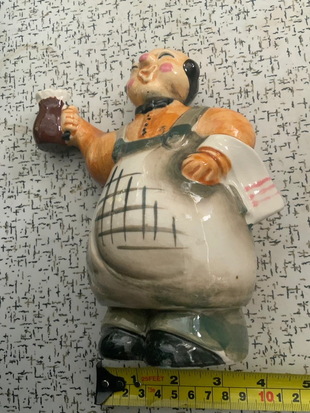 Ceramic Figurine of a Man with Beer Mug and Towel