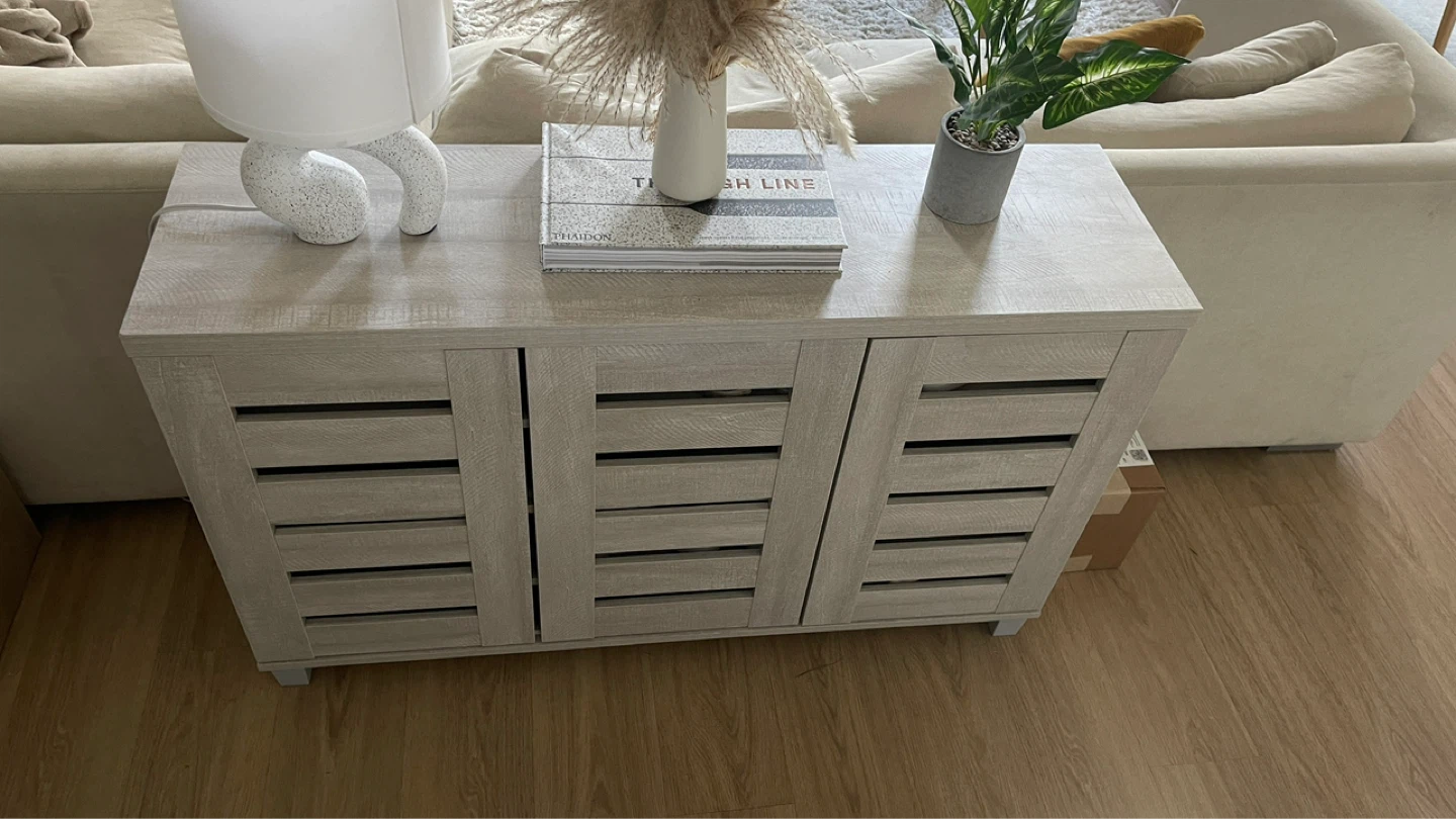 Light Wood Cabinet with Slatted Doors