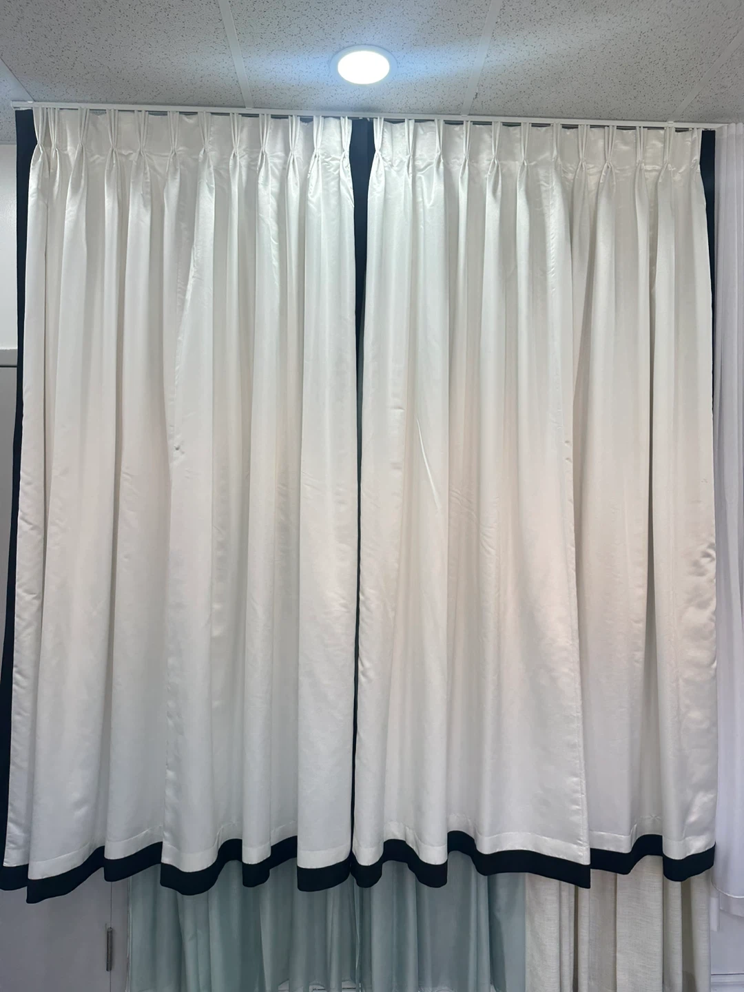 White curtains with black trim (F)