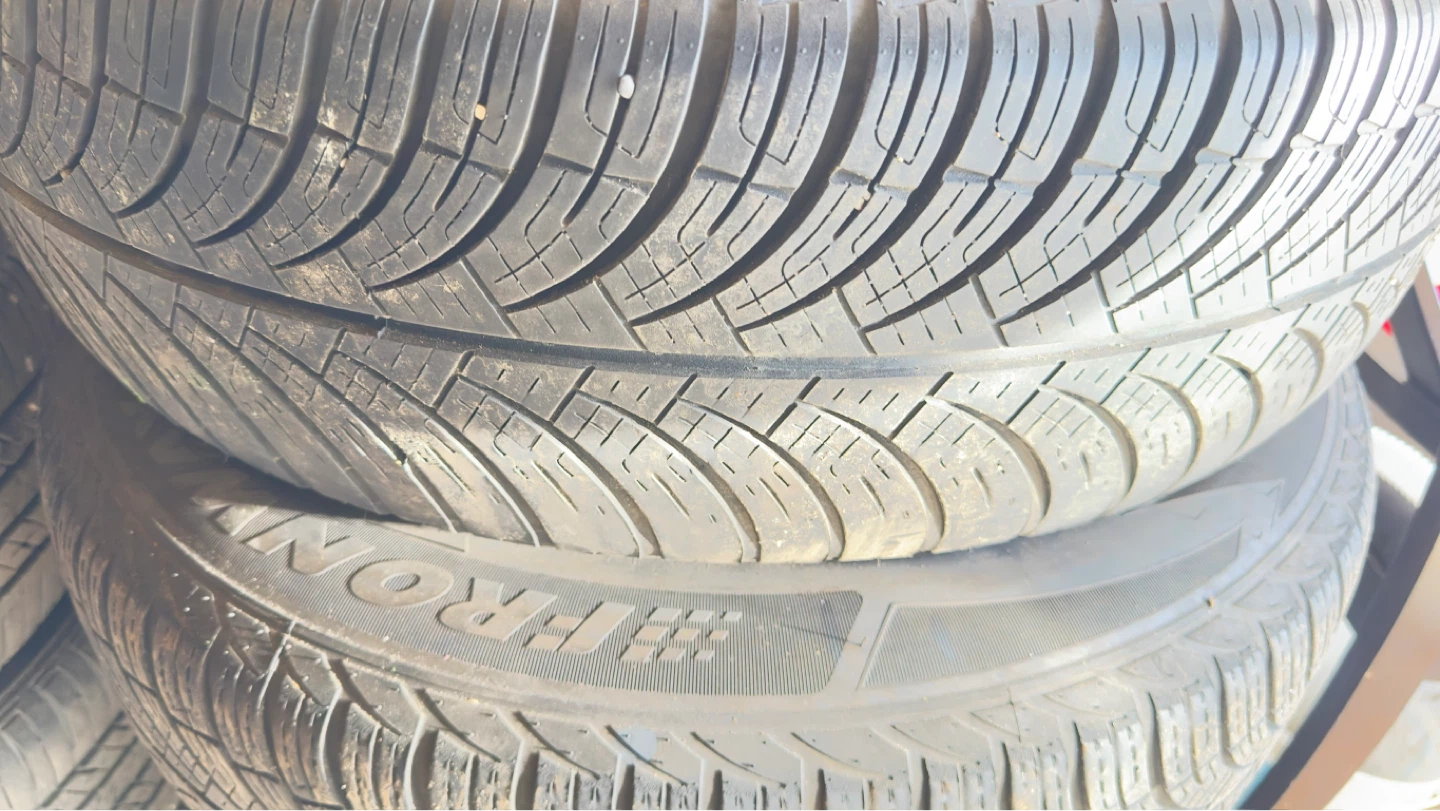 Four IRONMAN 225/65R17 Tires on Rims