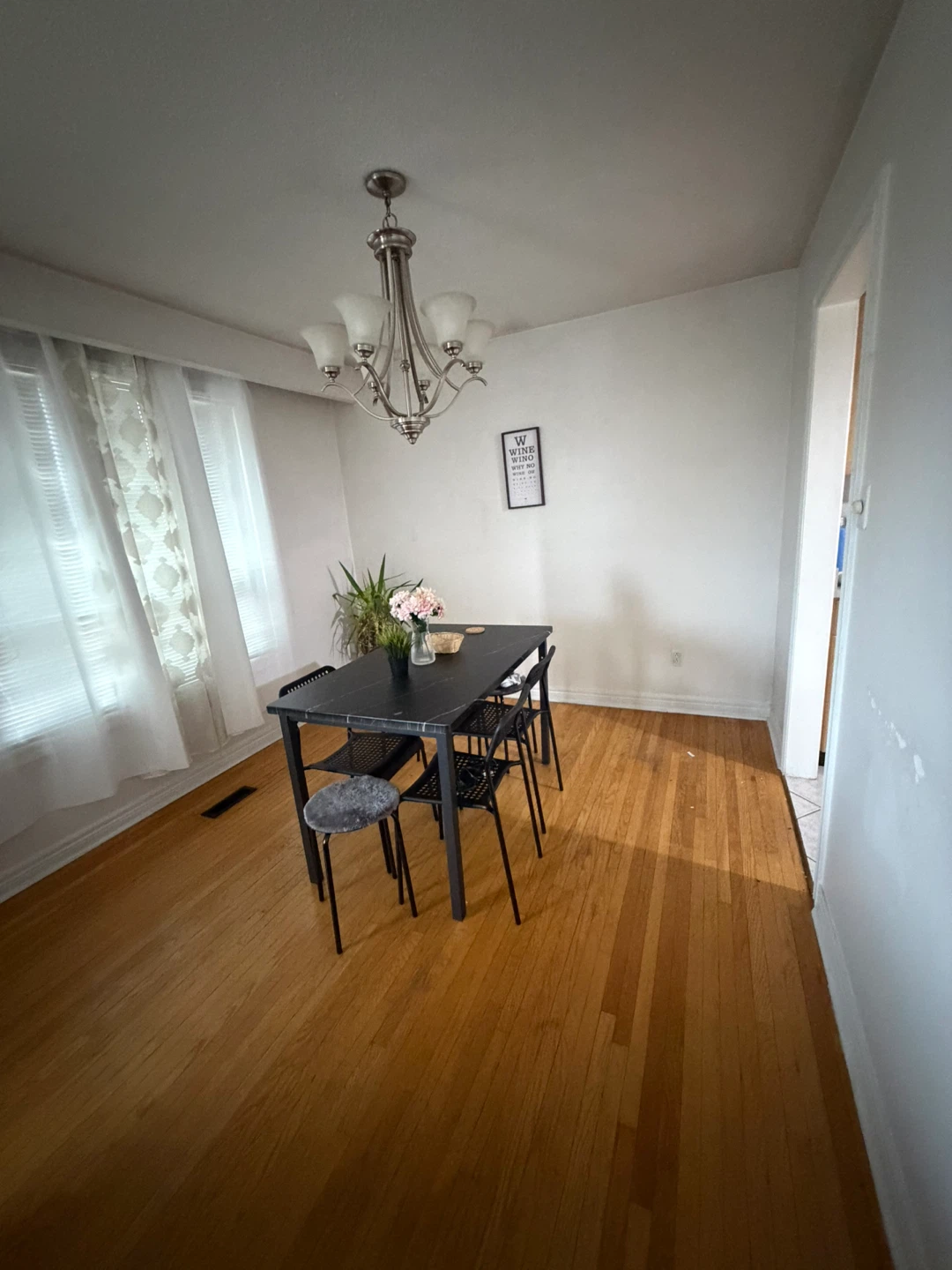Black Dining Table with Four Chairs
