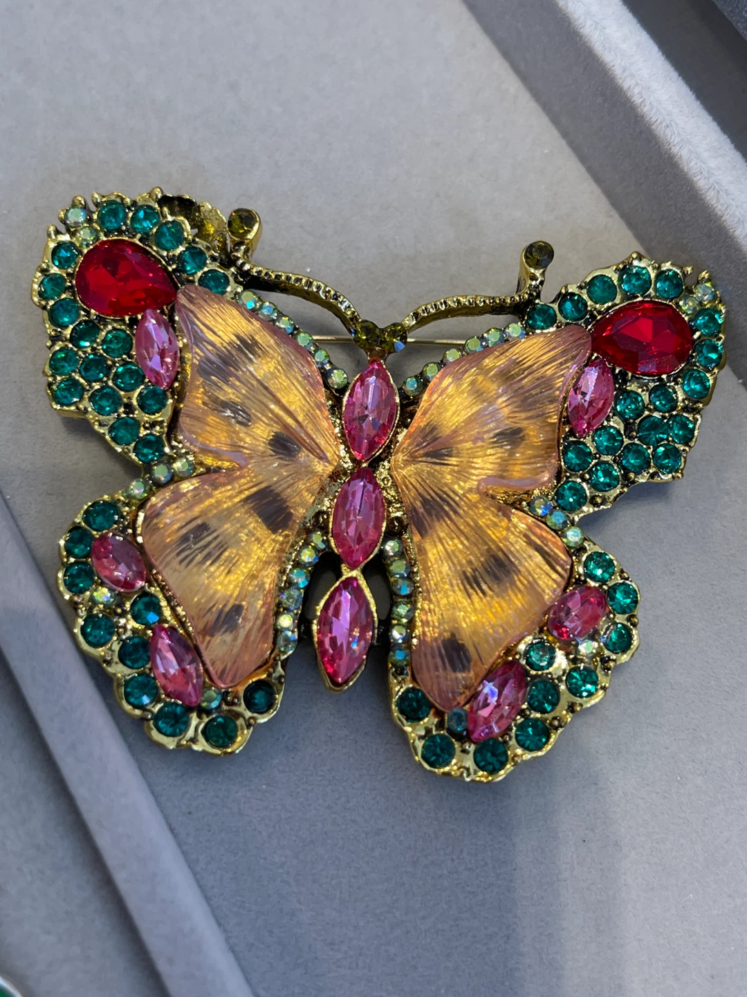 Sparkly Butterfly Brooch with Red, Pink, and Green Rhinestones