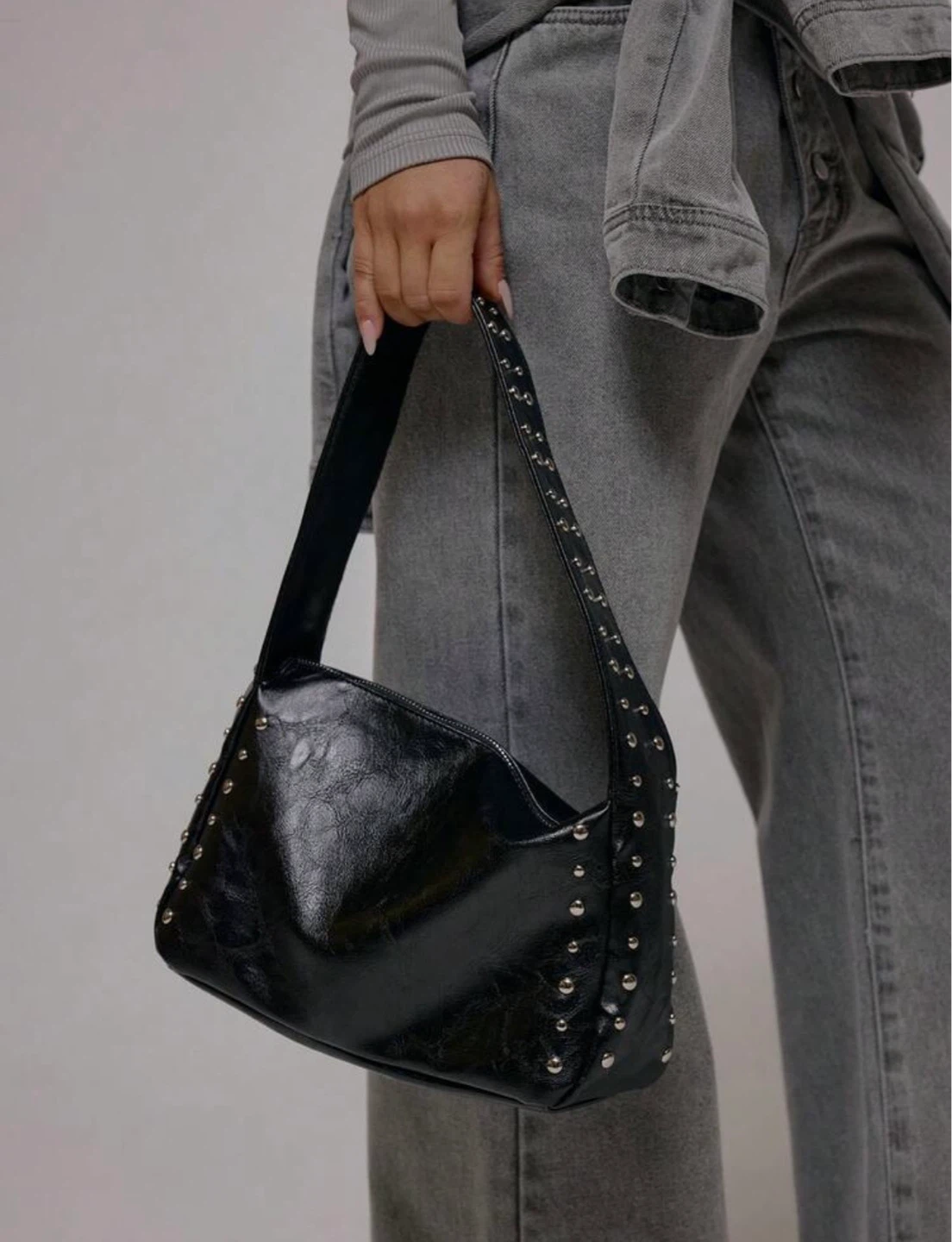 Black studded shoulder bag