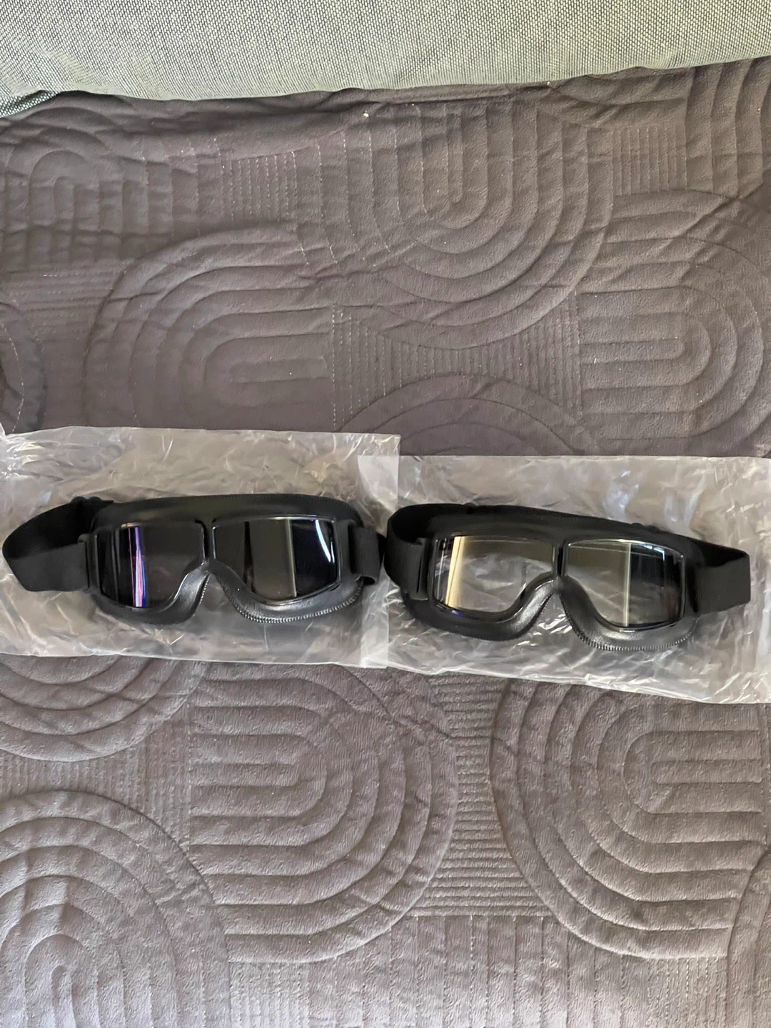 Pair of Black Motorcycle Goggles