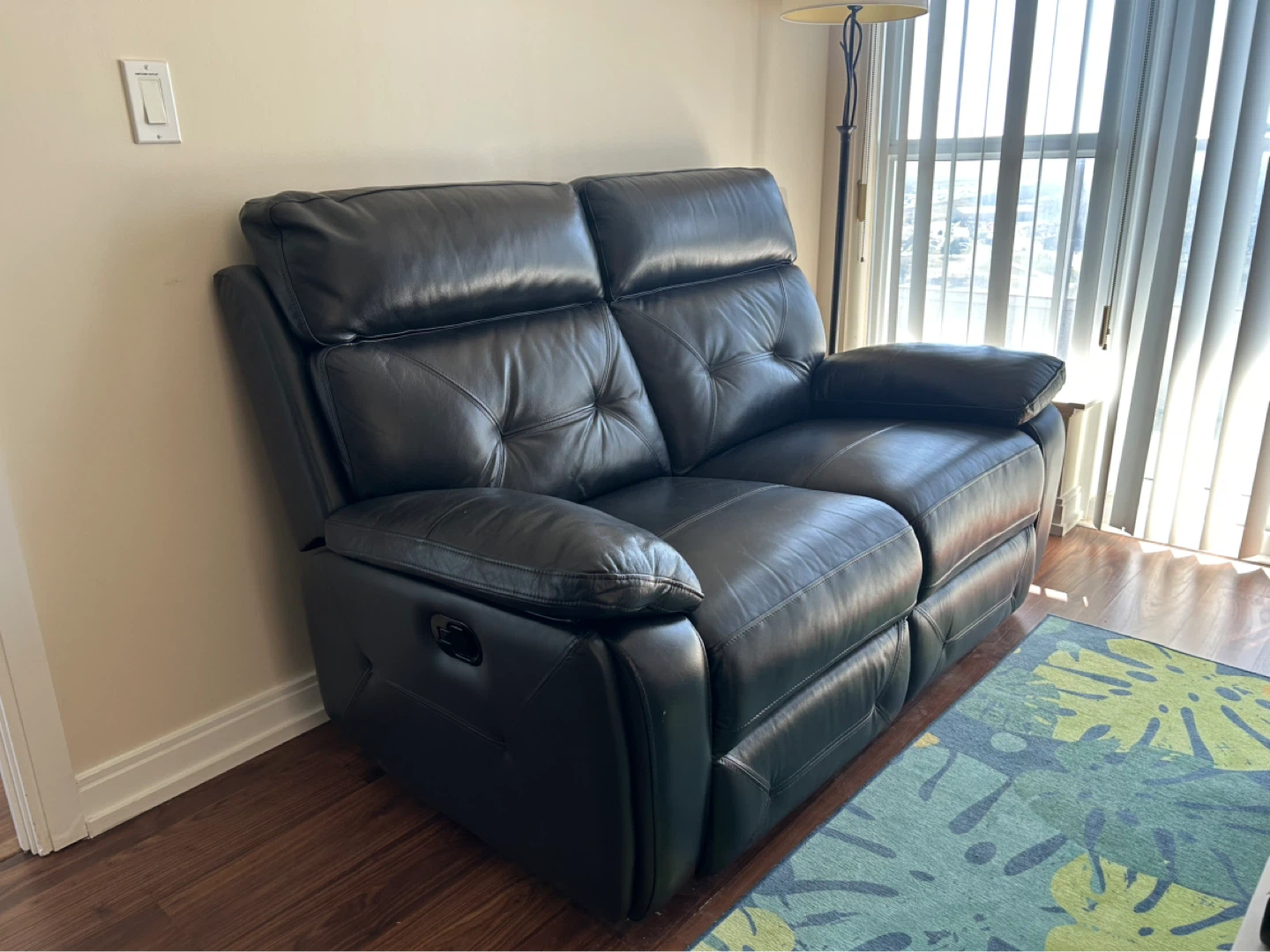 Black Leather Reclining Loveseat