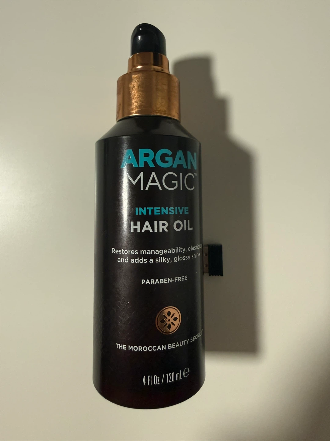 Argan Magic Intensive Hair Oil 4 Fl Oz half bottle
