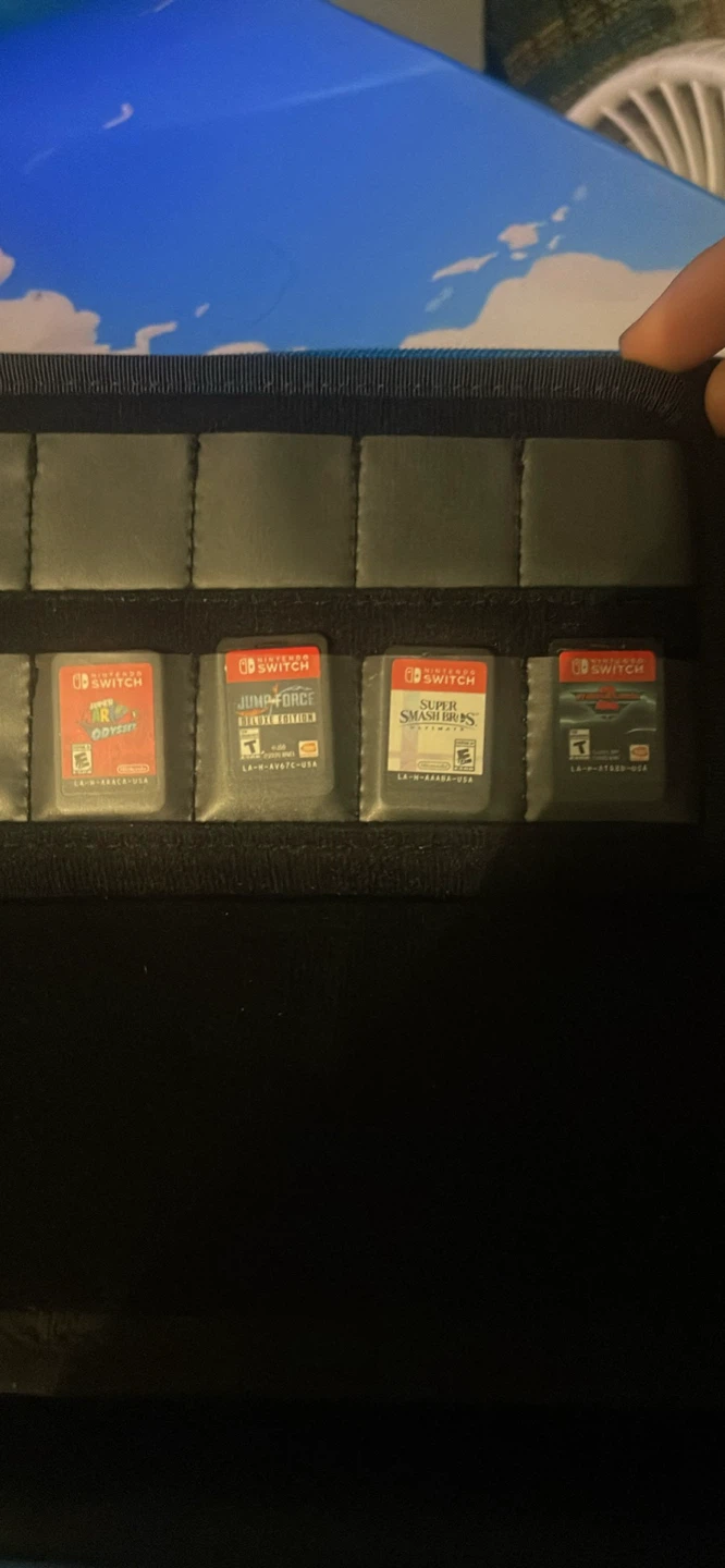 Nintendo Switch Console with Games and Accessories - photo 2