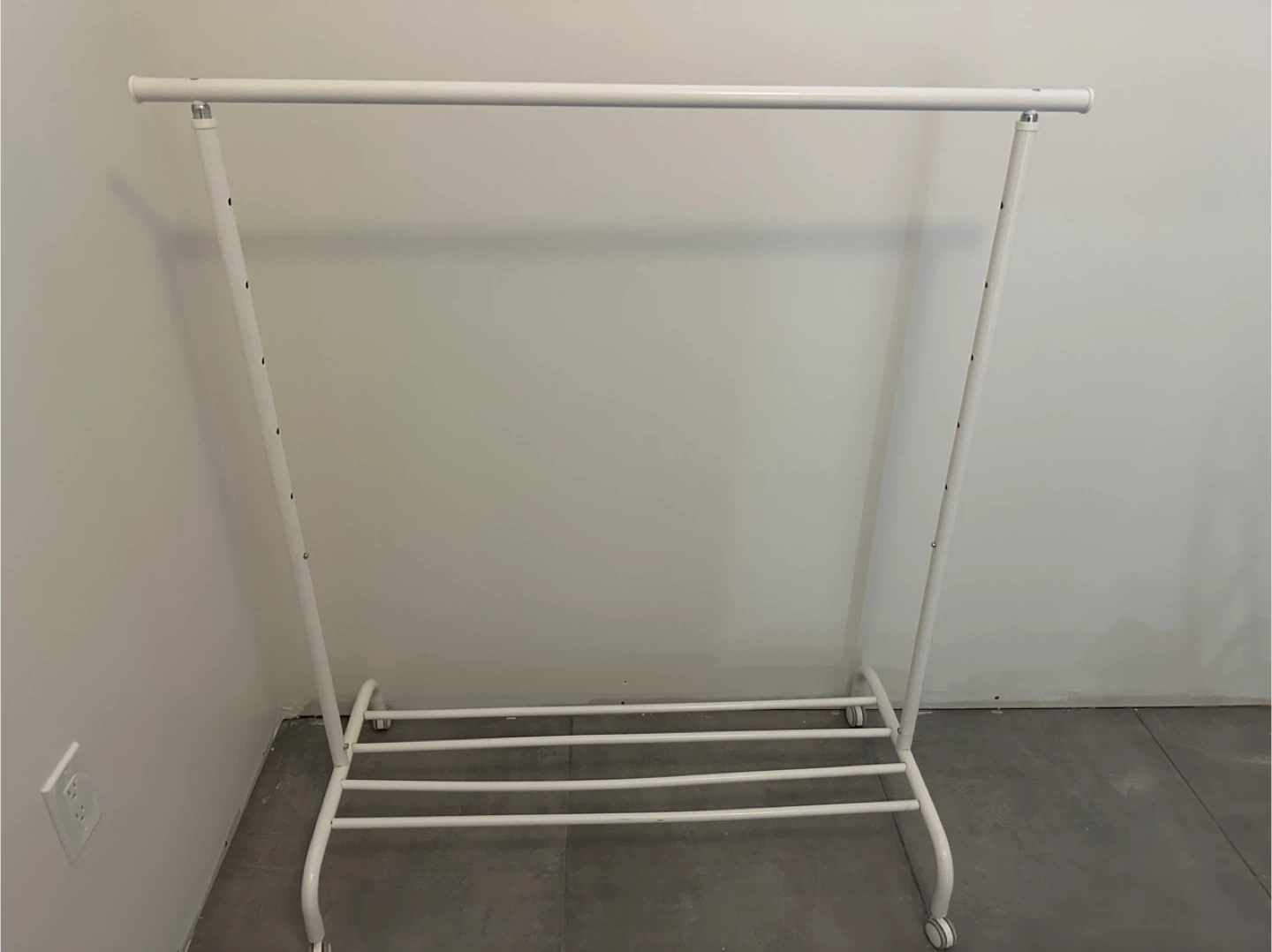 White Rolling Garment Rack. - photo 2