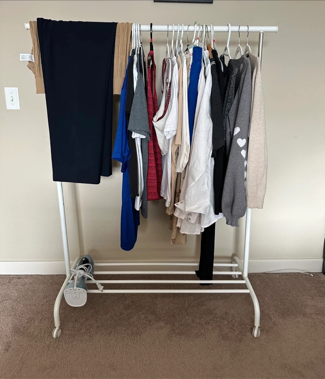 White Rolling Garment Rack.
