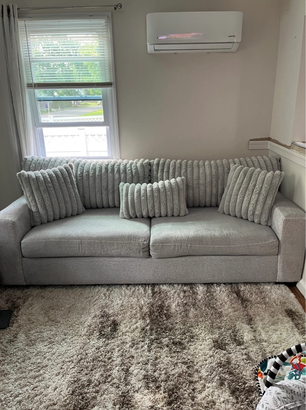 Gray Sofa with Matching Pillows