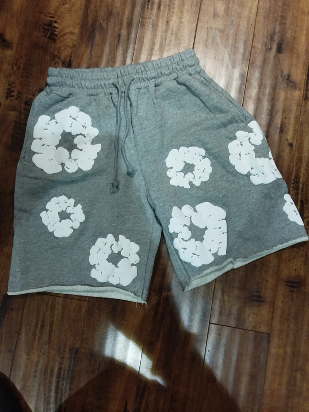 DENIM TEARS African Diaspora Goods Grey Shorts