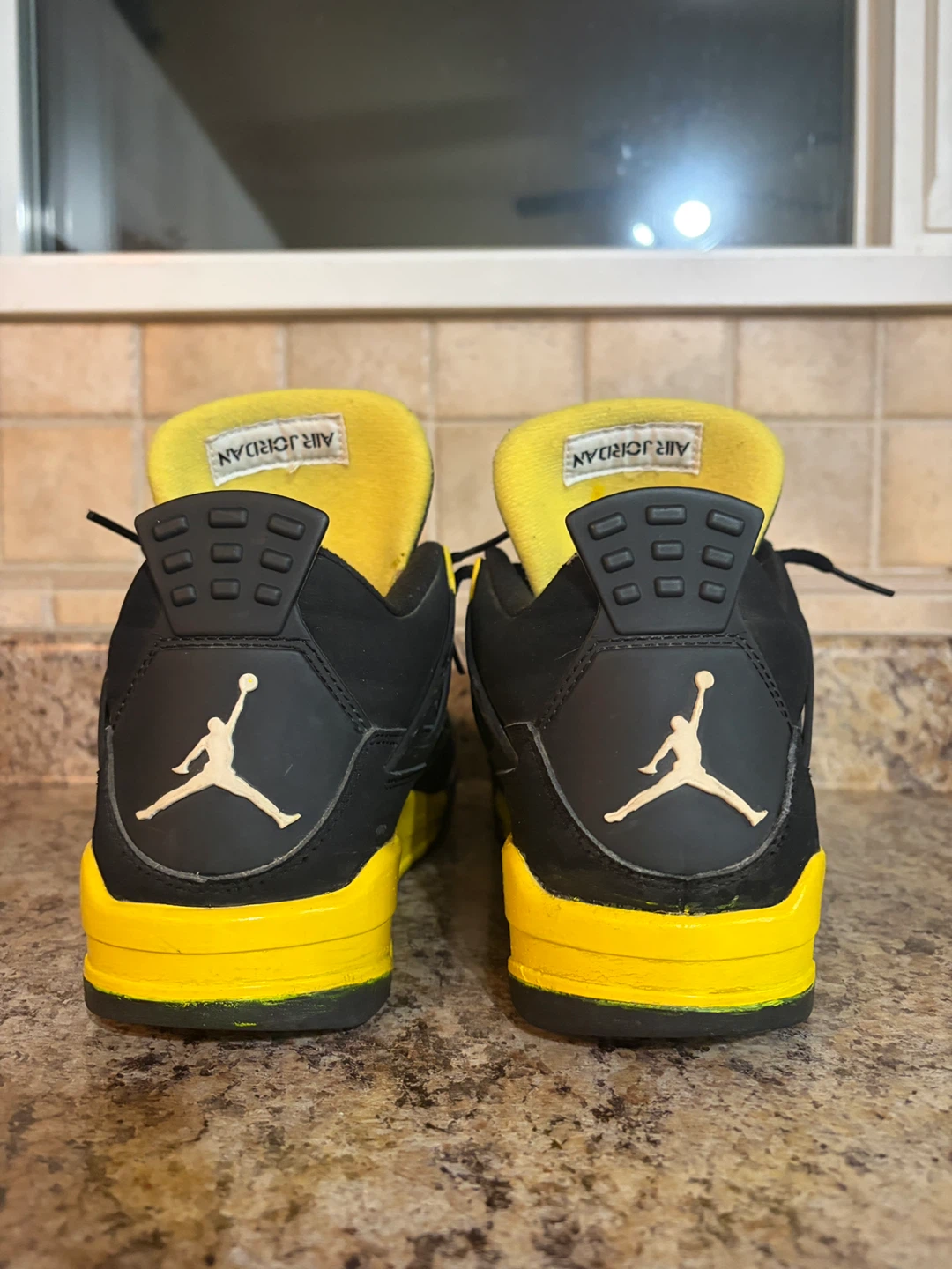 Air Jordan 4 "Lightning" Black/Tour Yellow Sneakers - photo 2