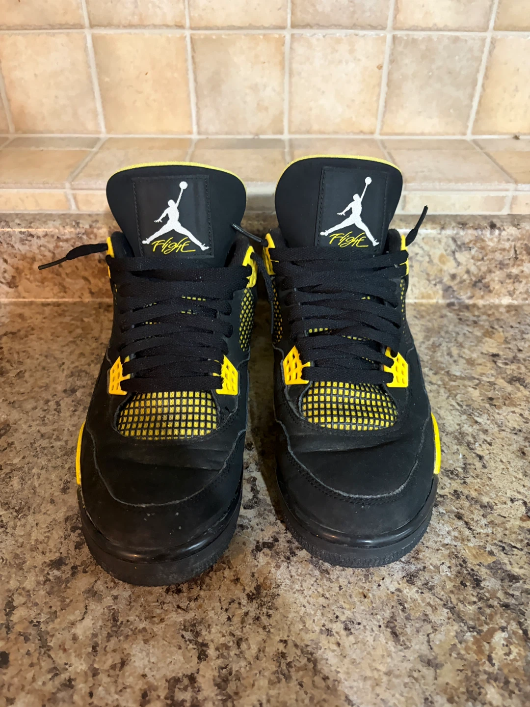 Air Jordan 4 "Lightning" Black/Tour Yellow Sneakers - photo 4