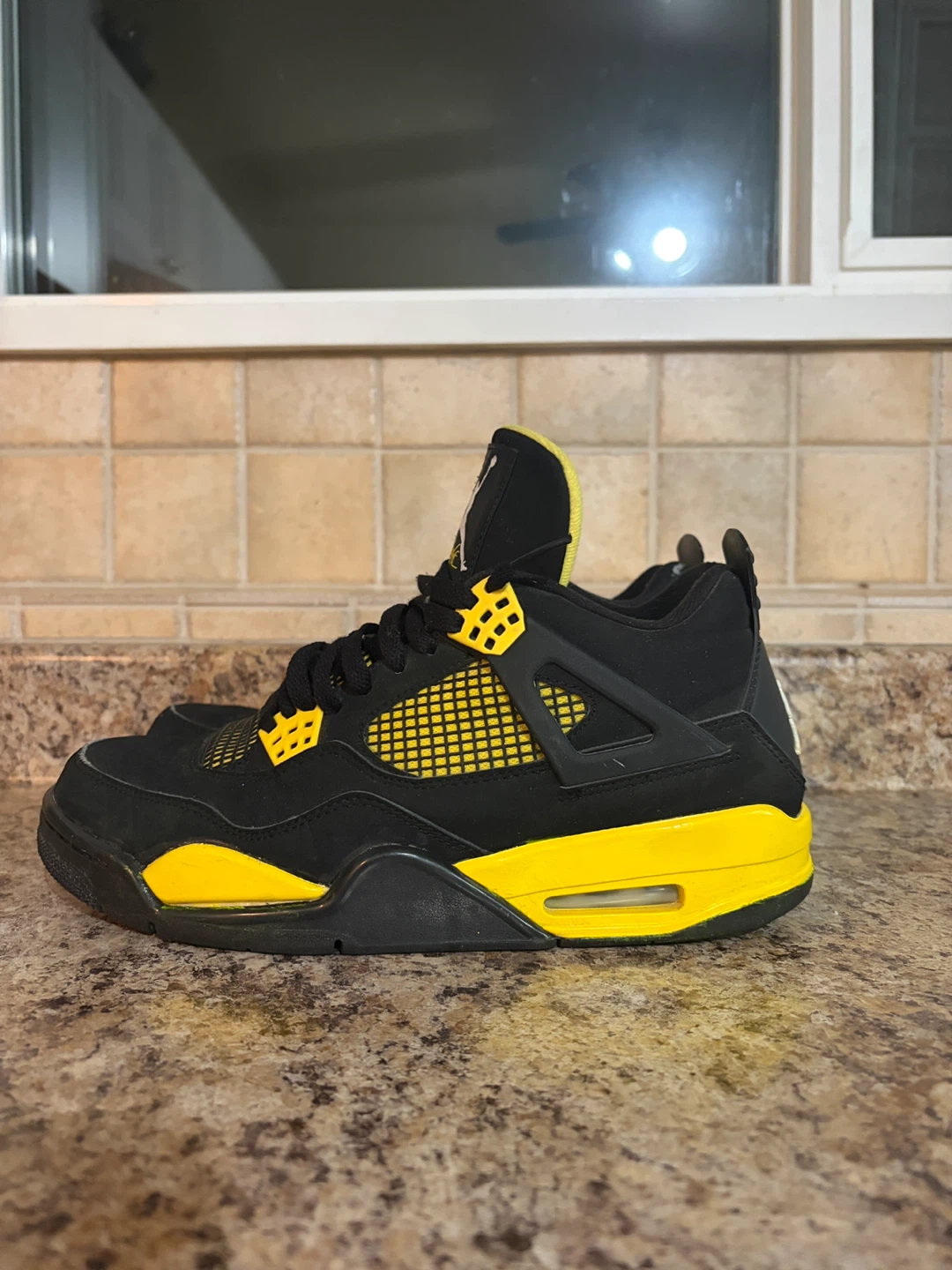 Air Jordan 4 "Lightning" Black/Tour Yellow Sneakers - photo 3