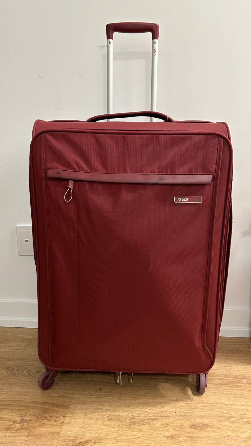 Burgundy Spinner Suitcase - check in luggage
