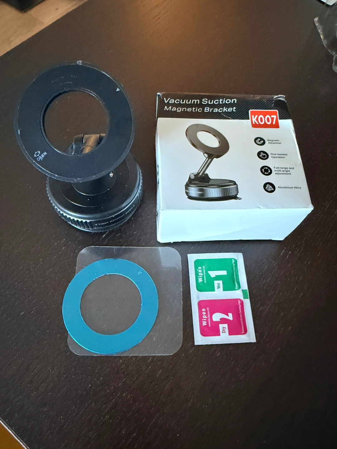 Vacuum magnetic phone holder