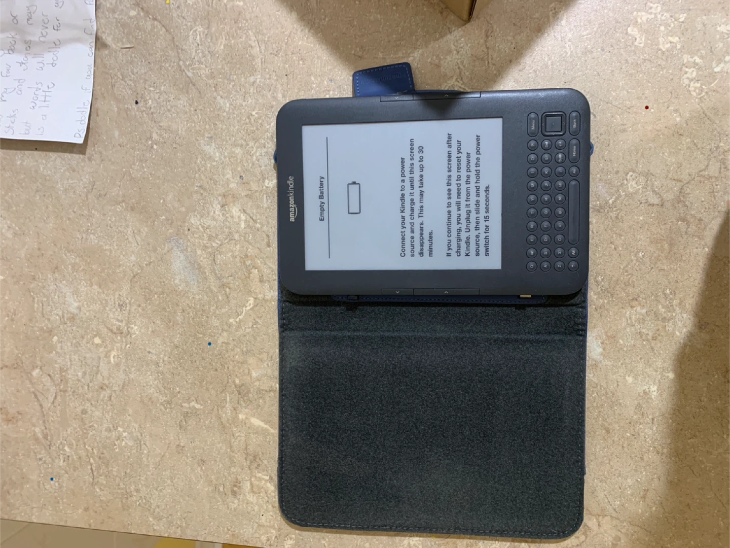 Amazon Kindle e-Reader with Blue Case