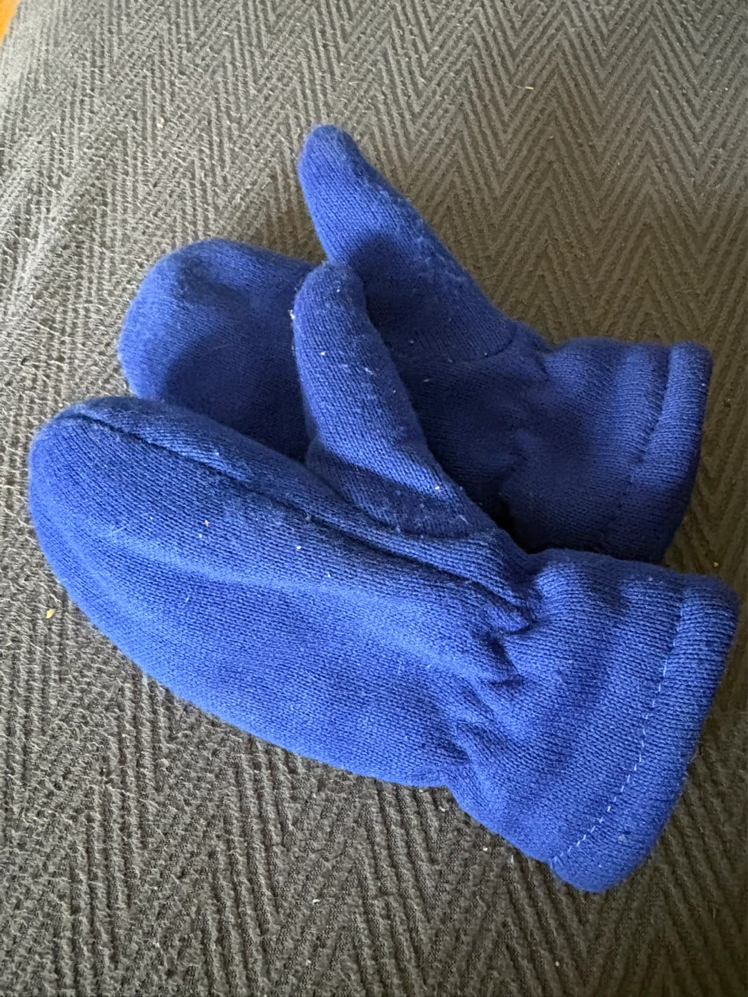 Blue knitted mittens