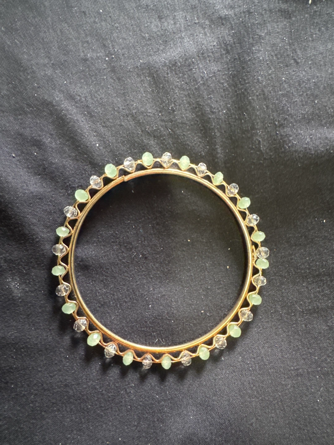 Gold Tone Bangle with Green and Clear Beads