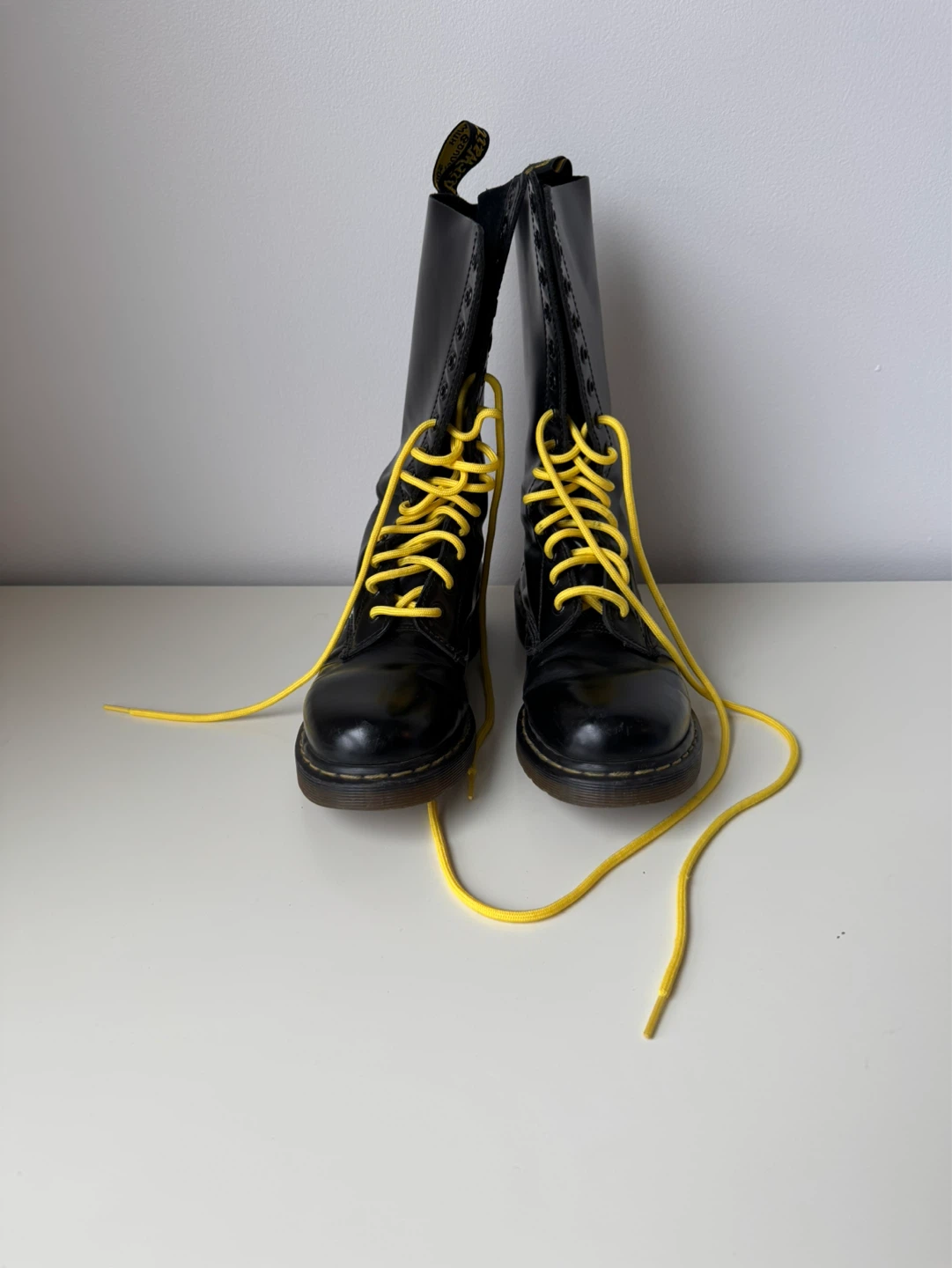 Dr. Martens Black Leather 14-Eye Boots with Yellow Laces