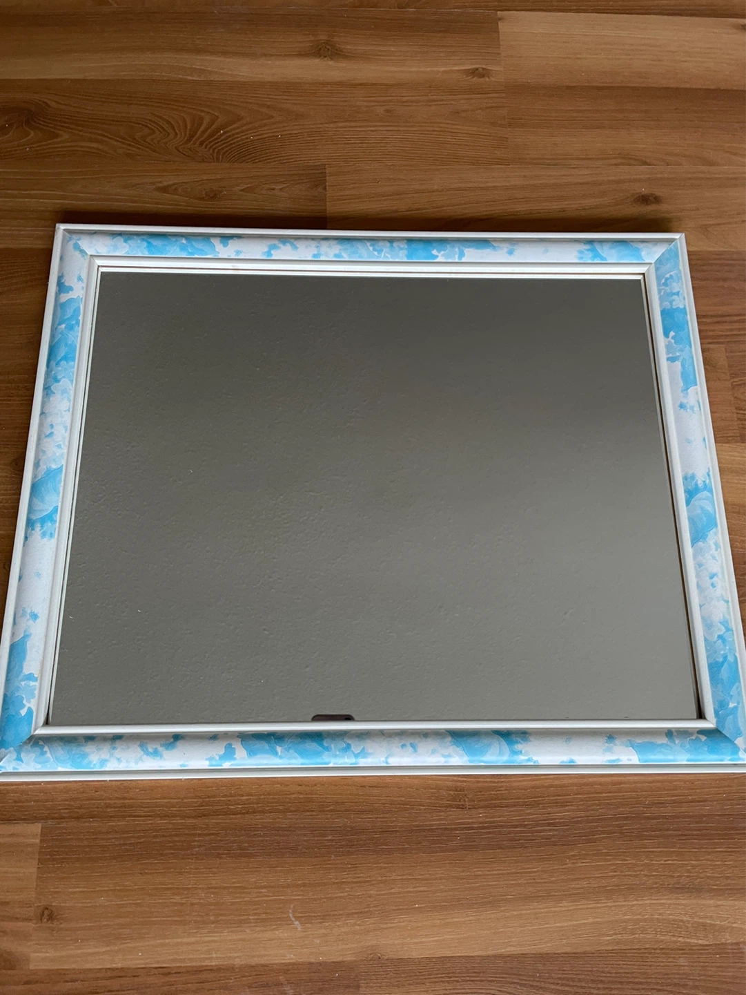 Decorative Wall Mirror with Blue and White Swirl Frame