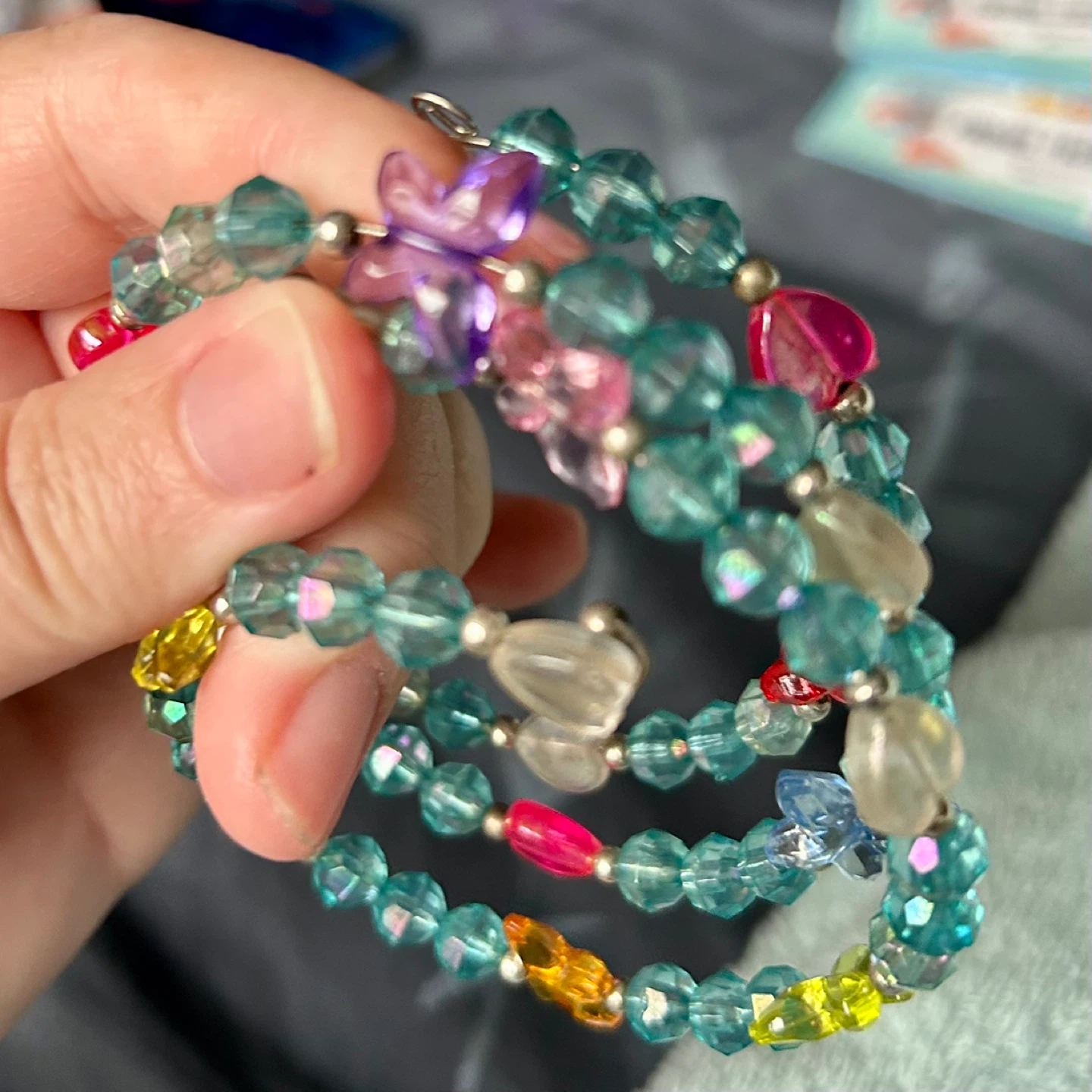 Beaded Coil Bracelet with Butterfly Charms - photo 2