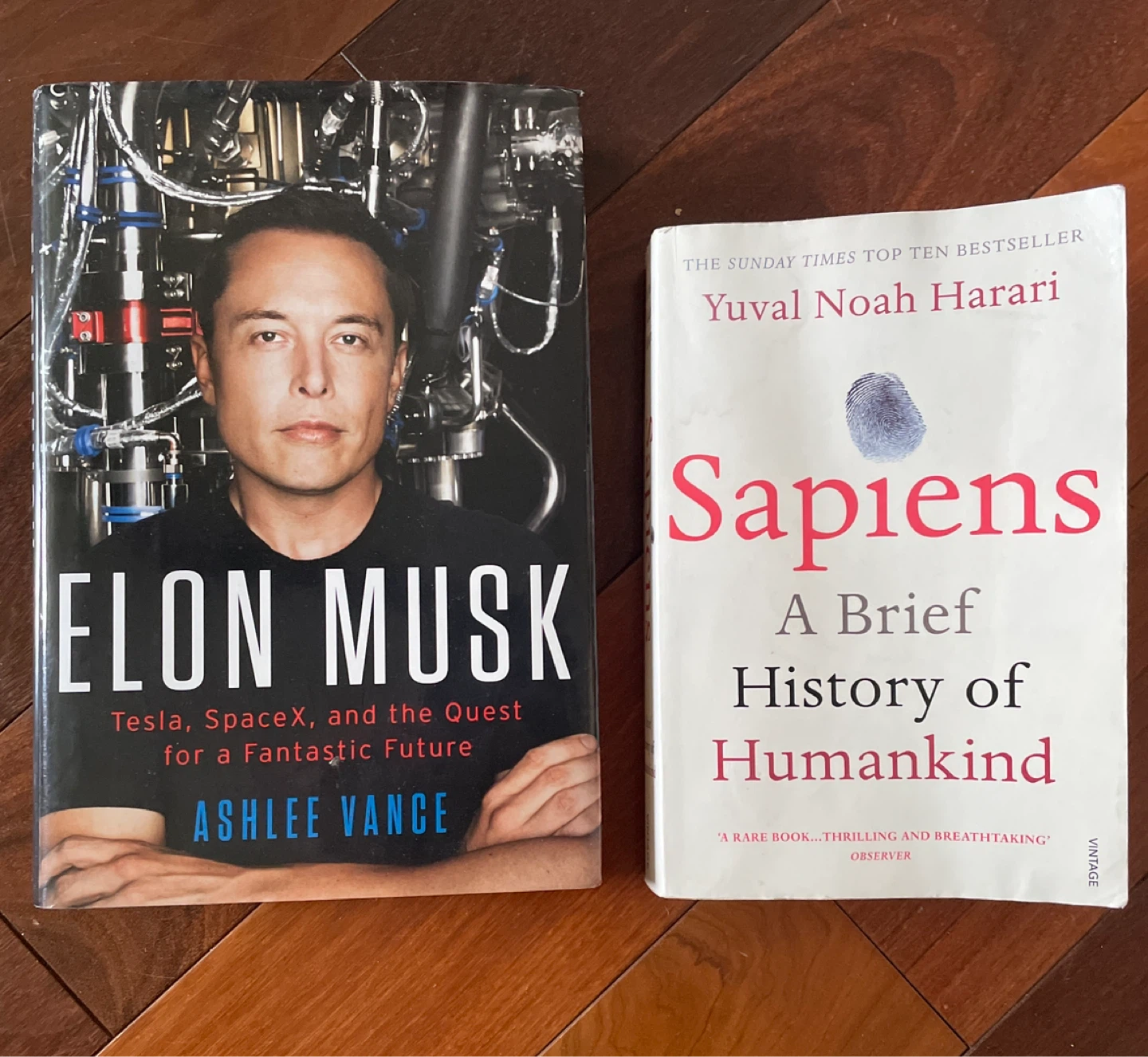 Elon Musk book and Sapiens book