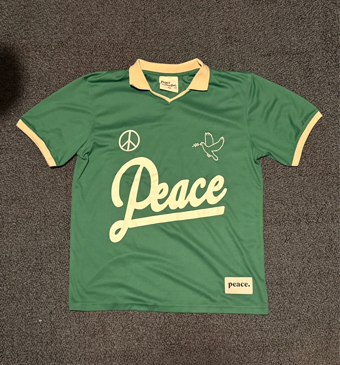 Peace Collective green & white rugby jersey. Size M