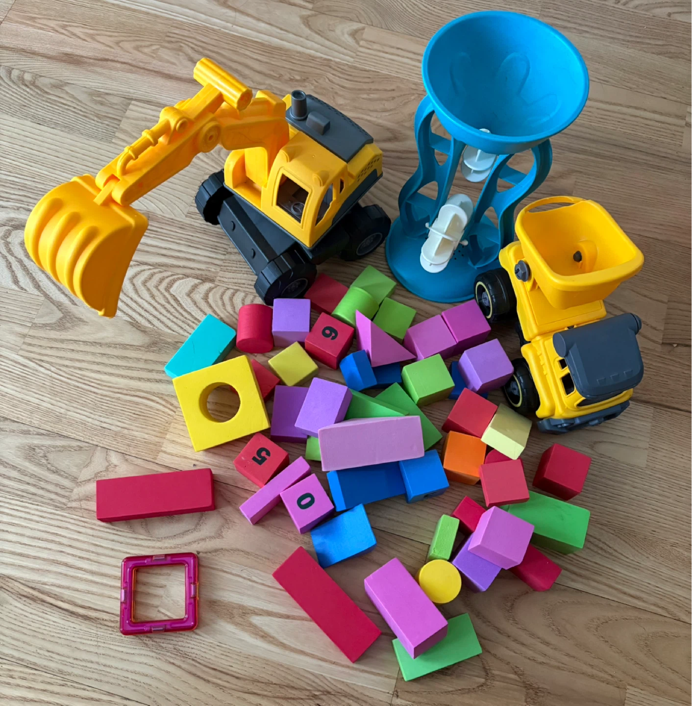 Toys! Foam Blocks, Construction toys, and a water toy.