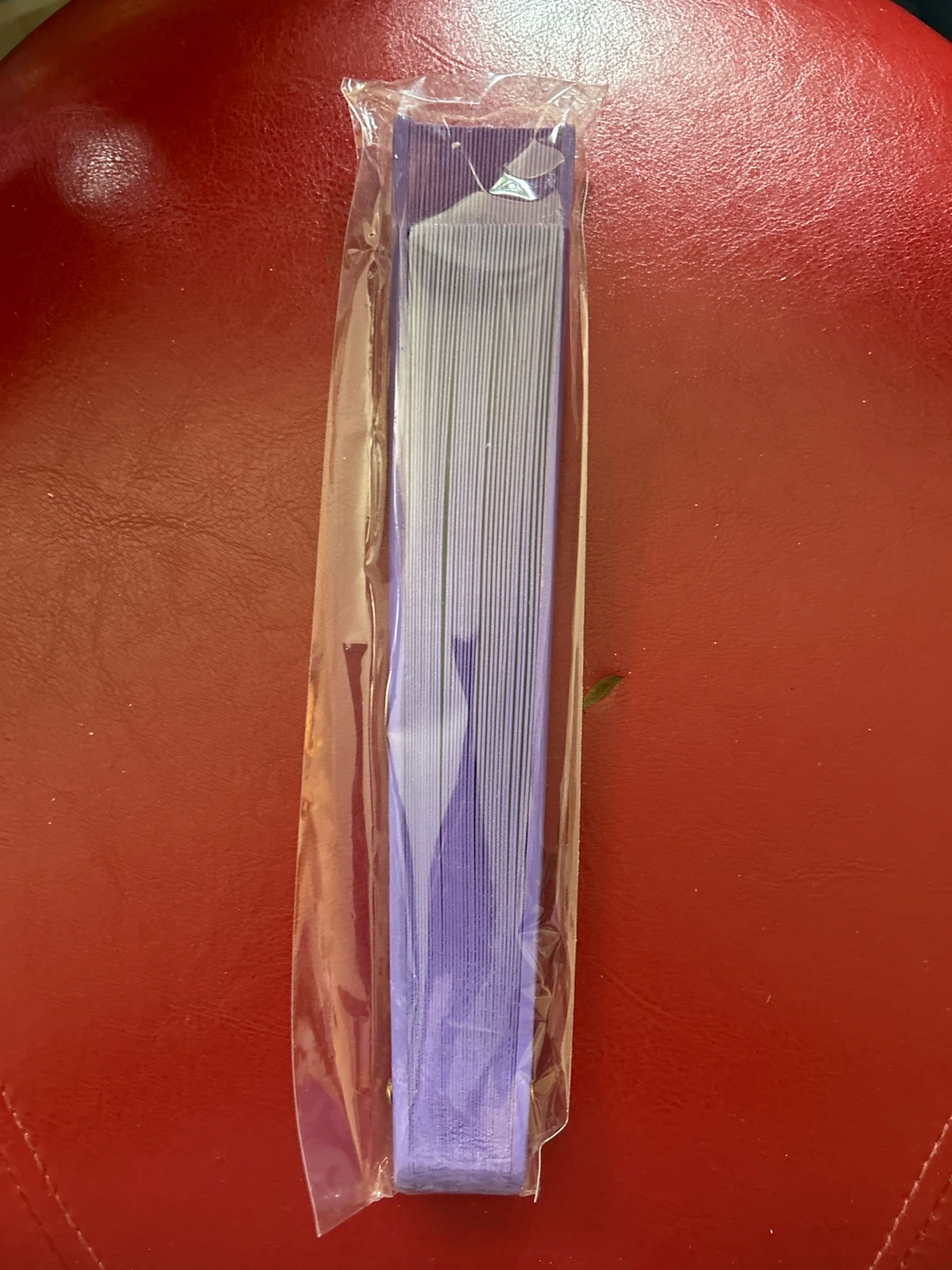 Purple folding fan