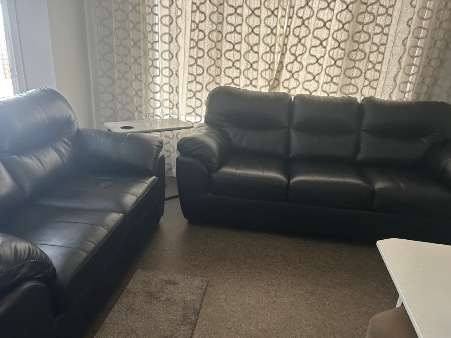 Two Black  Leather Sofas