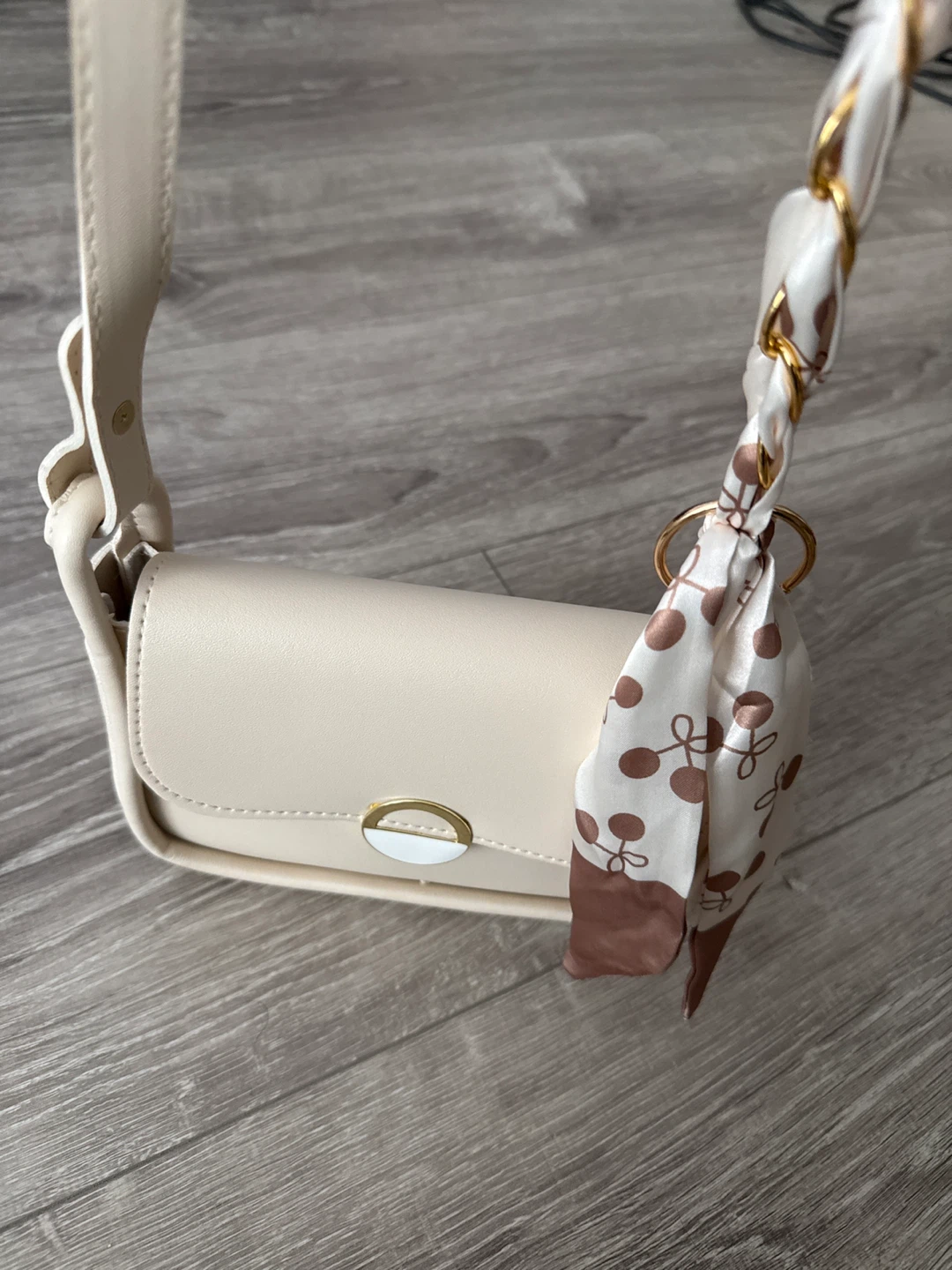 Cream handbag with scarf detail