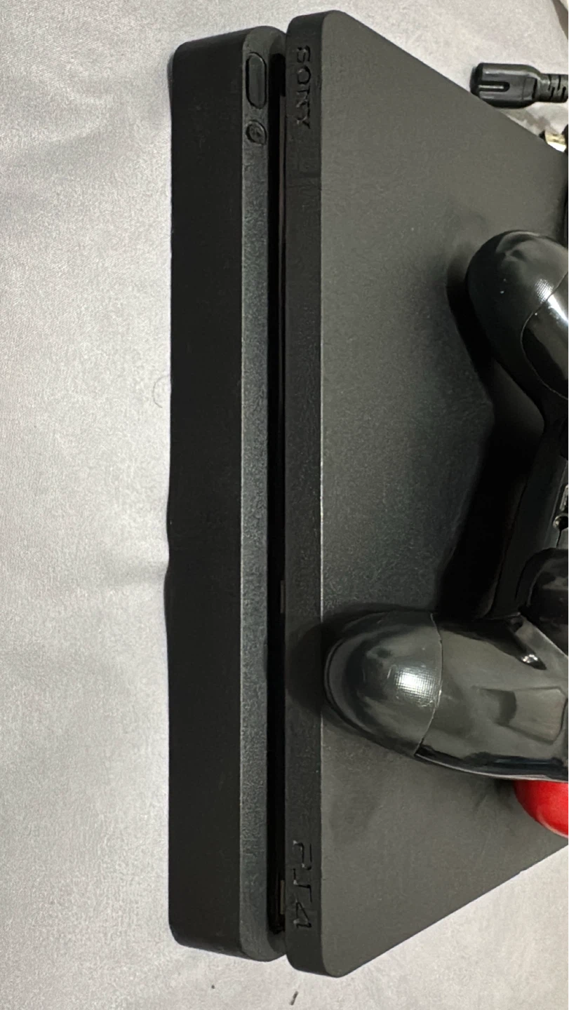 Sony PlayStation 4 Slim Console with 2 Controllers - photo 3